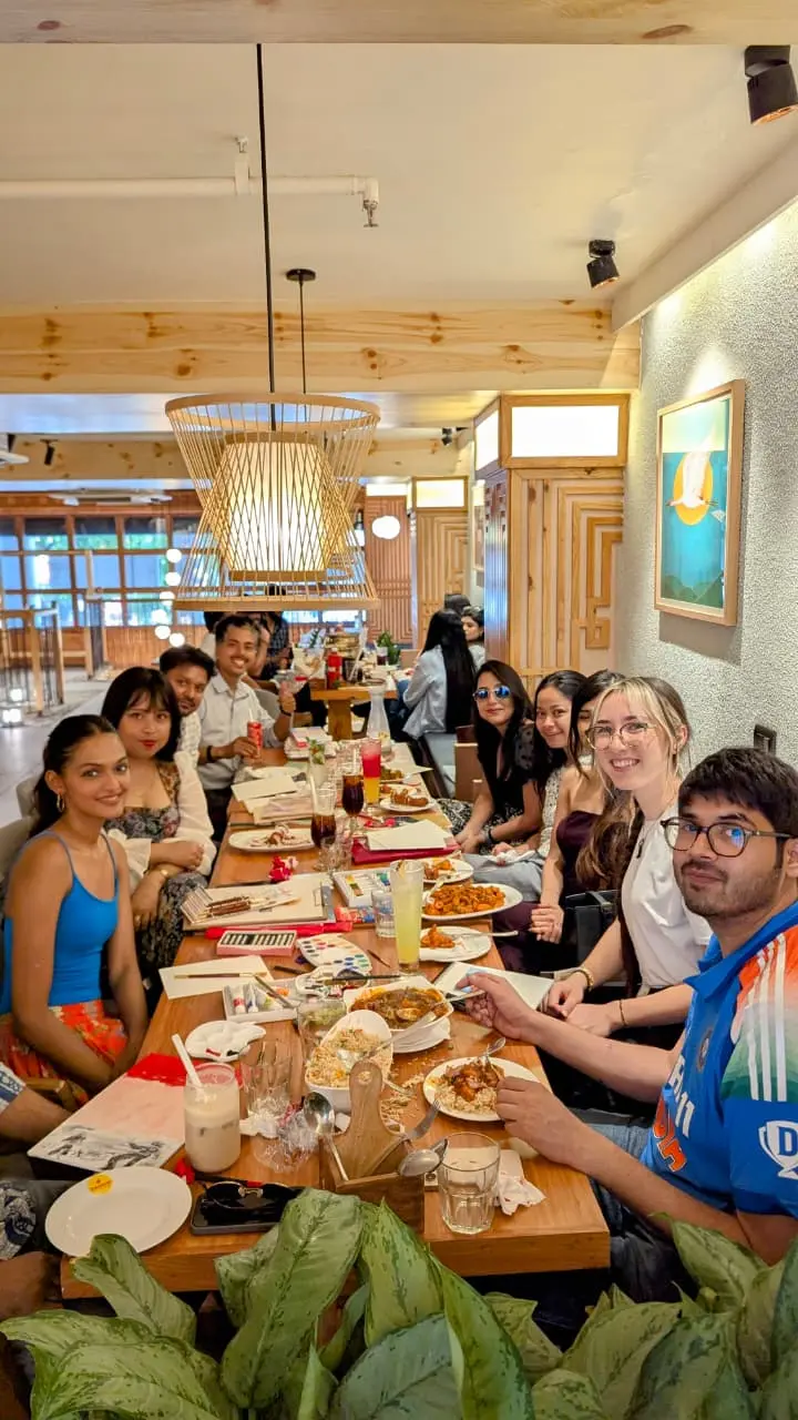 Guests sharing a community table