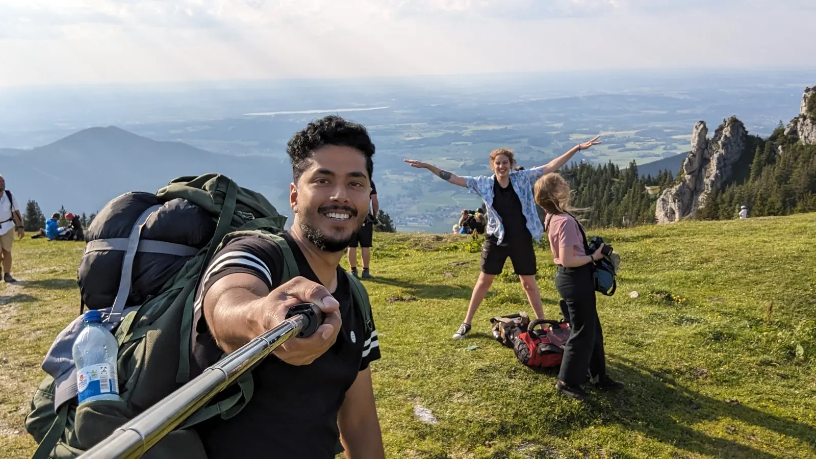 Shaw and friends on a sunny mountain hike