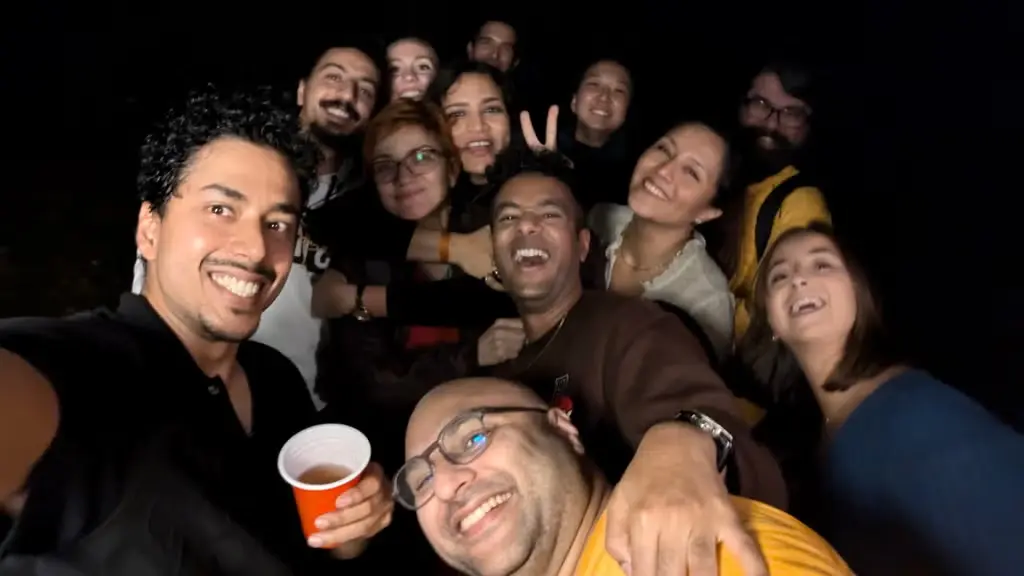 Guests at an evening community meetup